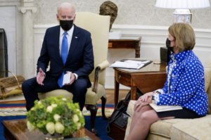 Sen. Shelley Moore Capito (R-W.Va.) listens as President Biden speaks in the Oval Office last month during a meeting with Republican senators.